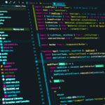 A code editor on a dark screen showing React source code